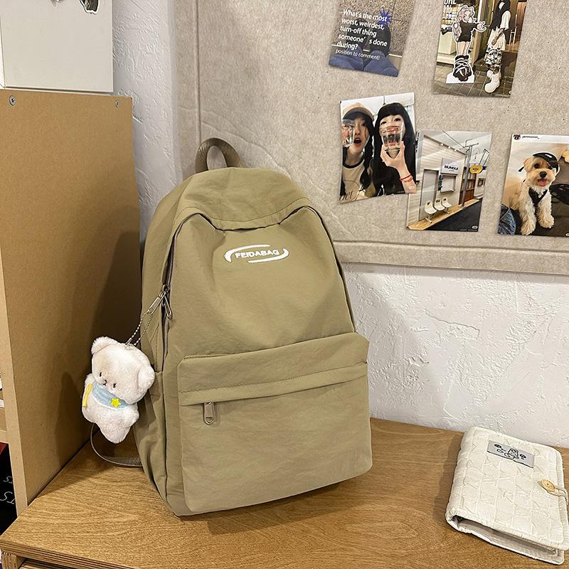 College style schoolbag for girls Junior high school students Simple large-capacity computer backpack Casual high school students Travel backpack tide