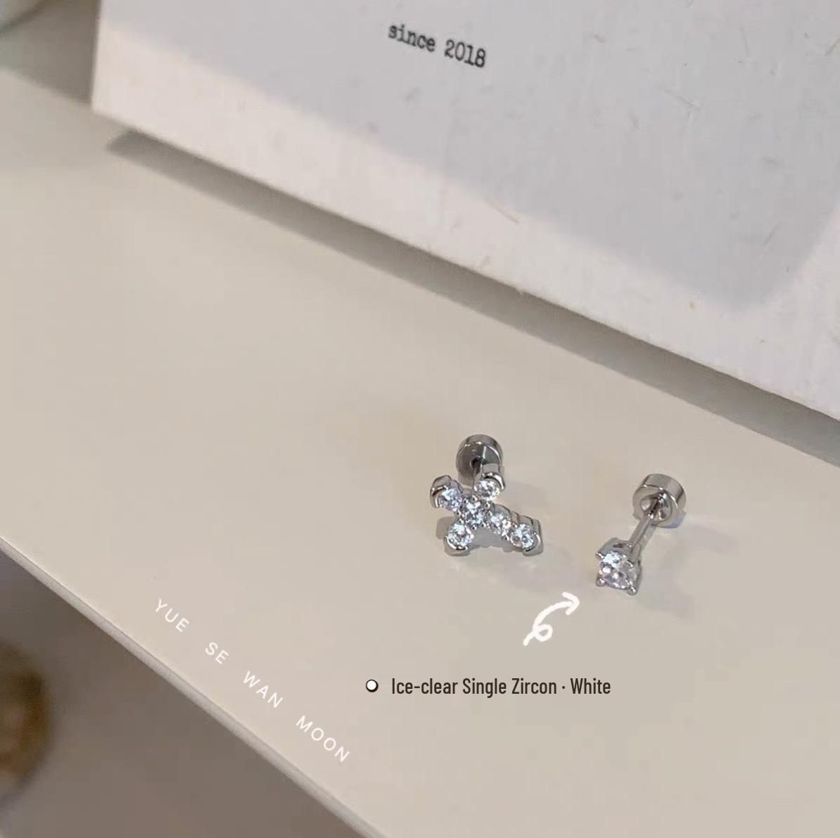 

Titanium Steel Cross Double Ear Hole Stud - No Need to Remove, Super Sparkly, Versatile Ear Cartilage Accessory.