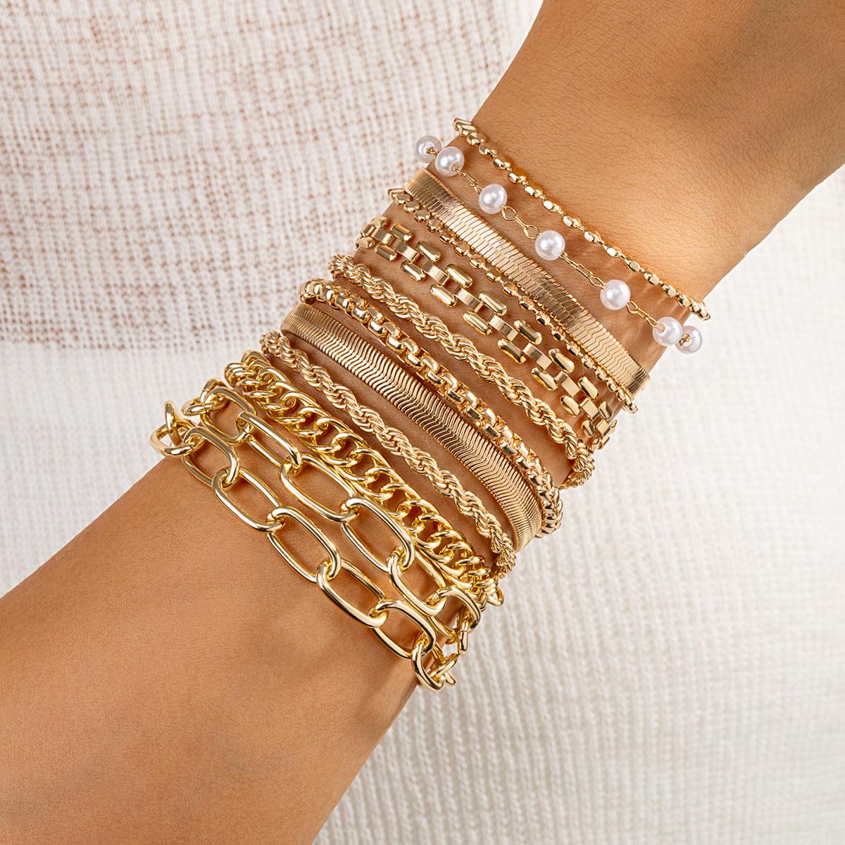 

12 piece fashionable simple chain design multi-layer overlapping snake bone chain Fried Dough Twists braid women s bracelet