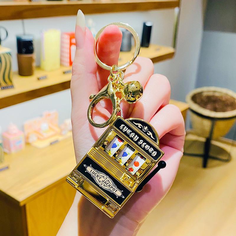 Delightful Gold And Silver Fruit Machine Keychain Thoughtful Gift For Any Occasion