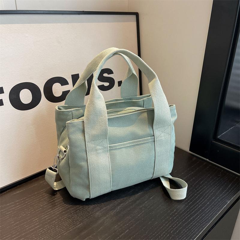 Casual Solid Color Canvas Bag Women's New Large-capacity Multi-layer Handbag Simple Tote Bag Shoulder Messenger Bag