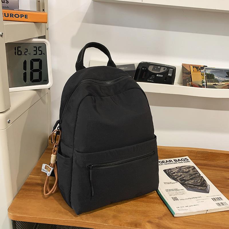College style schoolbag female college student simple solid color large capacity commuter backpack lightweight versatile high school backpack