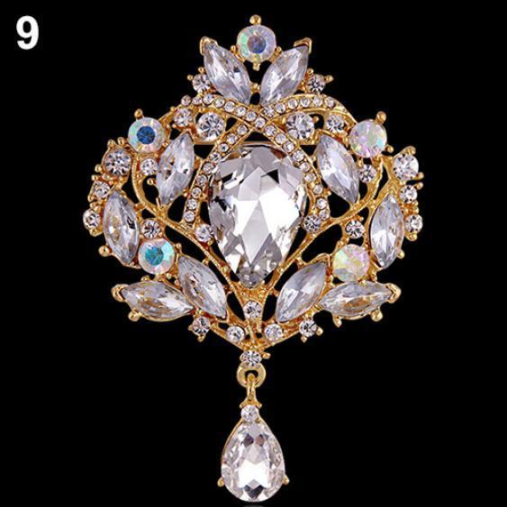 

Женская металлическая брошь с горным хрусталём золотистый/разноцветный