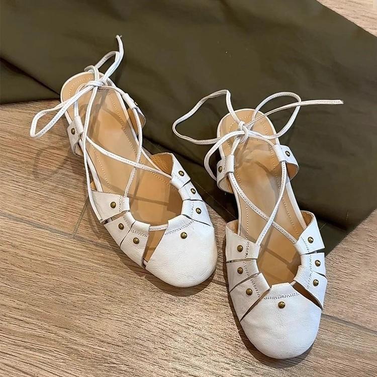 Niche version~ summer new rivet hollow cross strap bag head shoes women's retro shallow mouth low heel soft leather sandals
