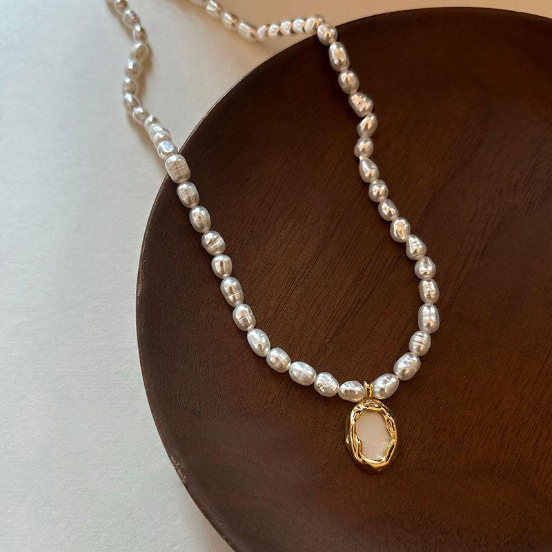 

Baroque Irregular Freshwater Pearl Necklace with Mother-of-Pearl Pendant