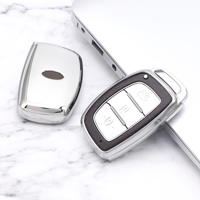 

Чехол для ключа Hyundai для Mistra, ix35, ix25, Elantra, Avante, Tucson, Sonata 9 – Полупрозрачная накладка с пряжкой. PE Bag серебряный