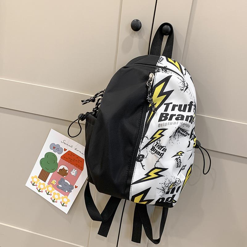 

Backpack New large-capacity dirt-resistant student backpack Trend graffiti schoolbag Premium sense versatile student backpack