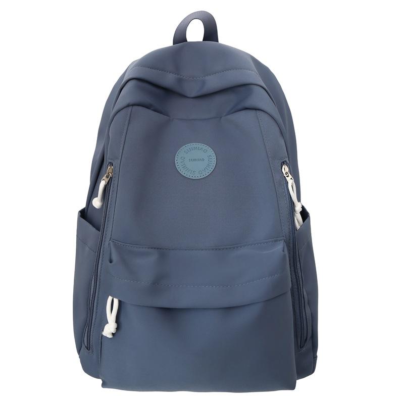 Einfacher einfarbiger leichter Rucksack Mädchen Joker Junior High School Alle Rucksäcke Shopping-Rucksack.