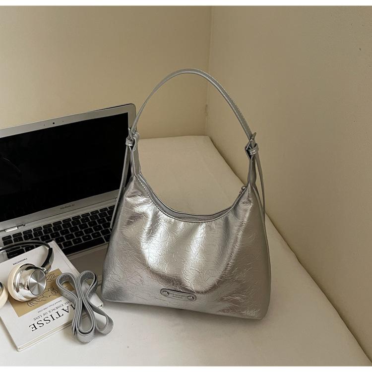 

2025 сумка подмышку высокой стоимости новая корейская версия модная простая женская сумка большой вместимости для通勤, универсальная плечевая сумка-мессенджер серебряный