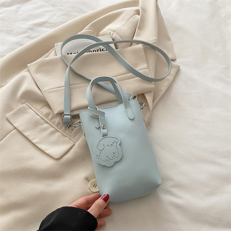 

Summer new solid color light and portable vertical storage mobile phone bag simple casual shoulder messenger bag