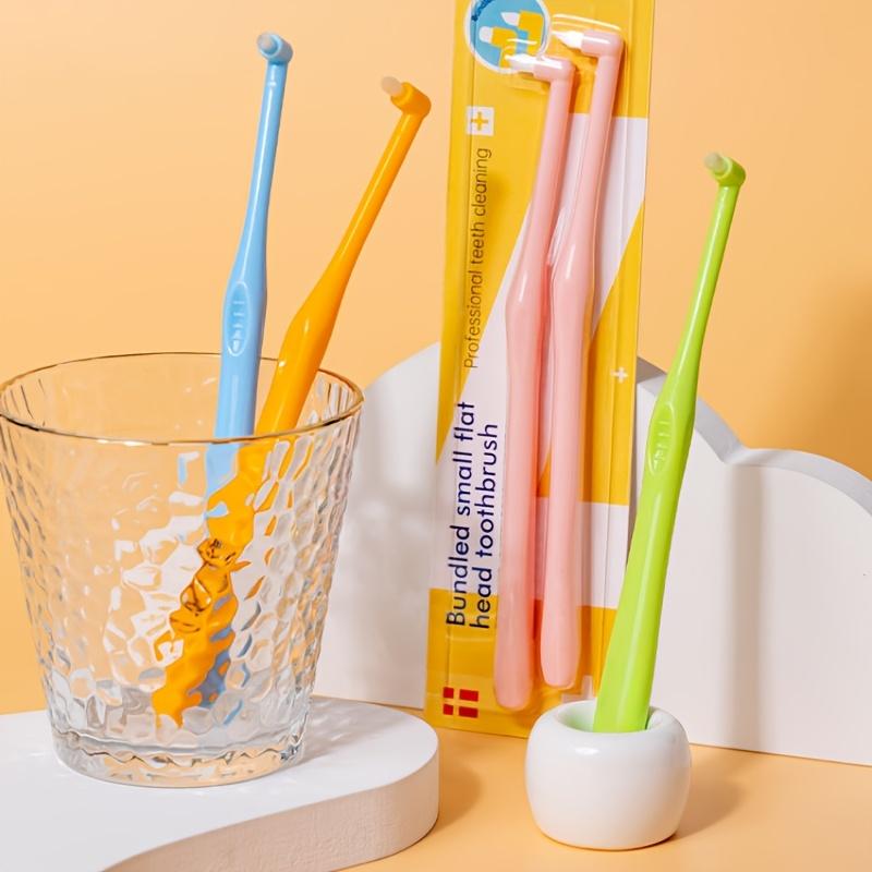 A Set of Two Soft-Bristled Toothbrushes for Cleaning Between Teeth.