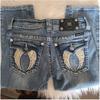 ZYLLO American Vintage Y2K Rhinestone Wing Embroidered Jeans Womens Blue Low Rise Flared Denim Pants with Studded Pockets Streetwear