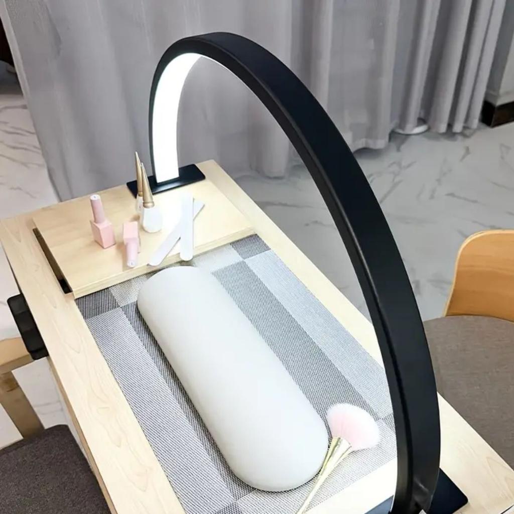 The crescent shaped nail lamp has adjustable brightness and color temperature, suitable for nail eyelash extension and skincare