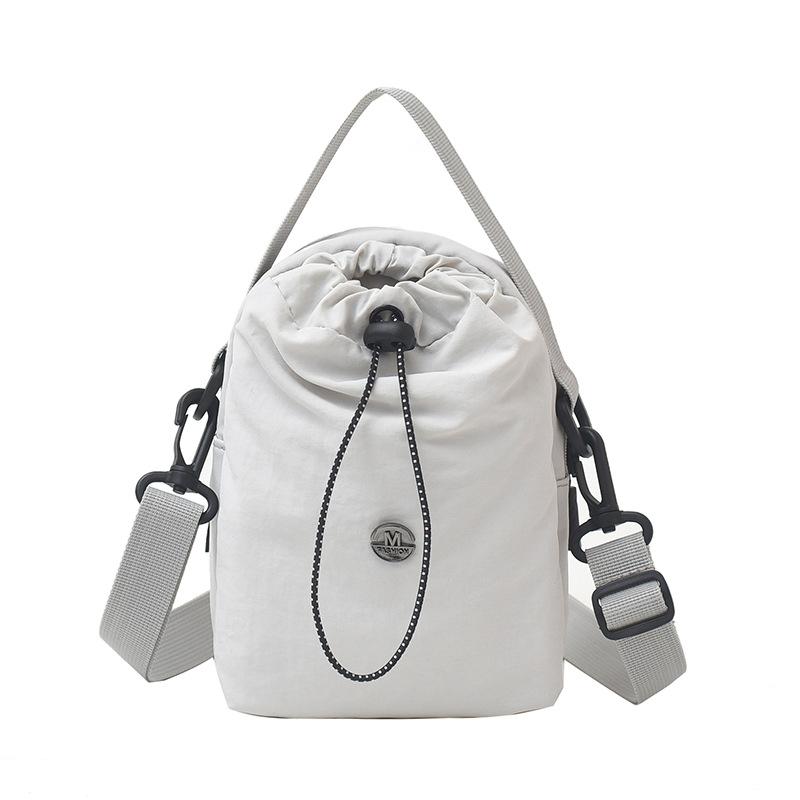Kettle bag waterproof casual shoulder bag women's tide brand versatile mobile phone bag fitness walking messenger bag water cup cloth bag men