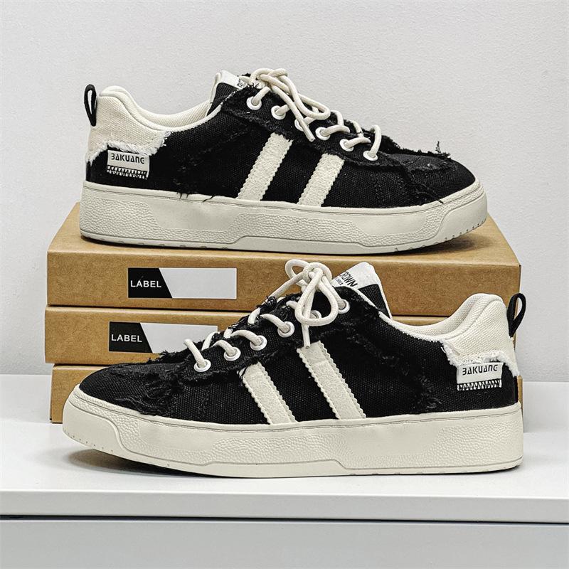 

2025 new men s canvas shoes Korean version of niche casual white shoes versatile wear-resistant trend men s shoes 1221 44 чорний