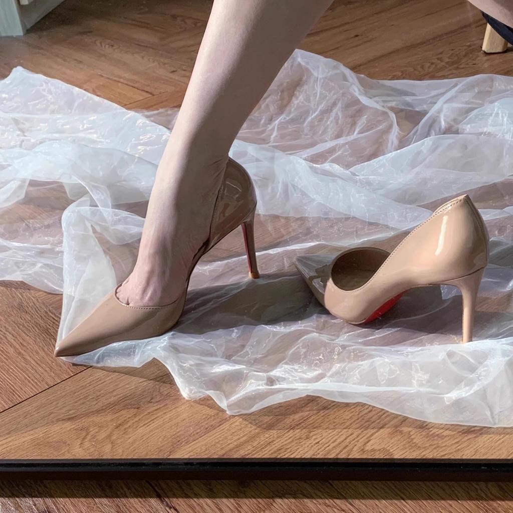 Spring and summer 2026 new single shoes women's pointed toe nude patent leather sexy side stiletto ol commuting red-soled high heels