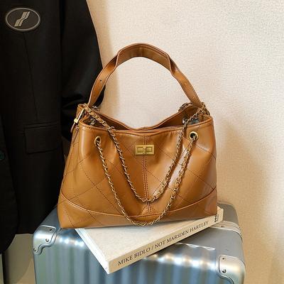 Neue Mode Rindsleder Rhombus Kette Kleine Tragetasche Einzelner Rucksack Streuner Tasche Echtes Leder Eimer Damentasche