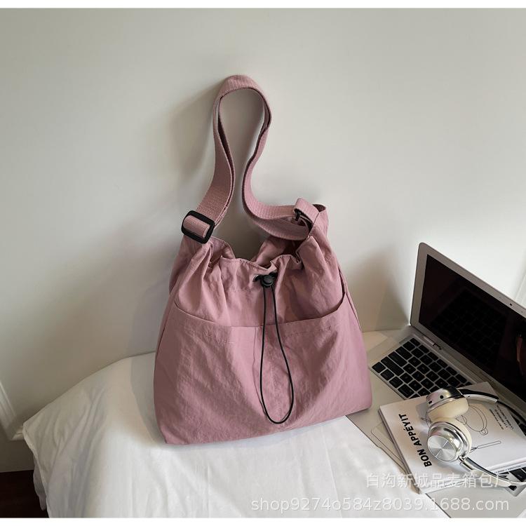 New fashion drawstring shoulder women's bag Internet celebrity pleated nylon messenger bag Korean version niche casual literary tote bag