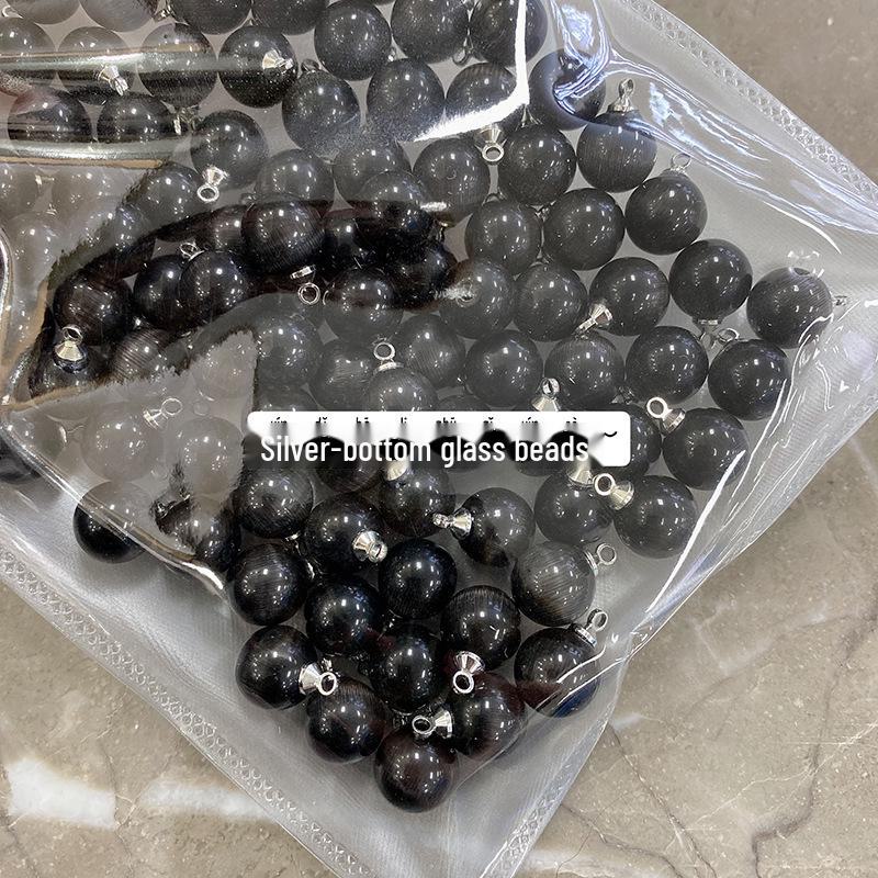 

Свитер-кардиган с перламутровыми пуговицами и серебристым низом