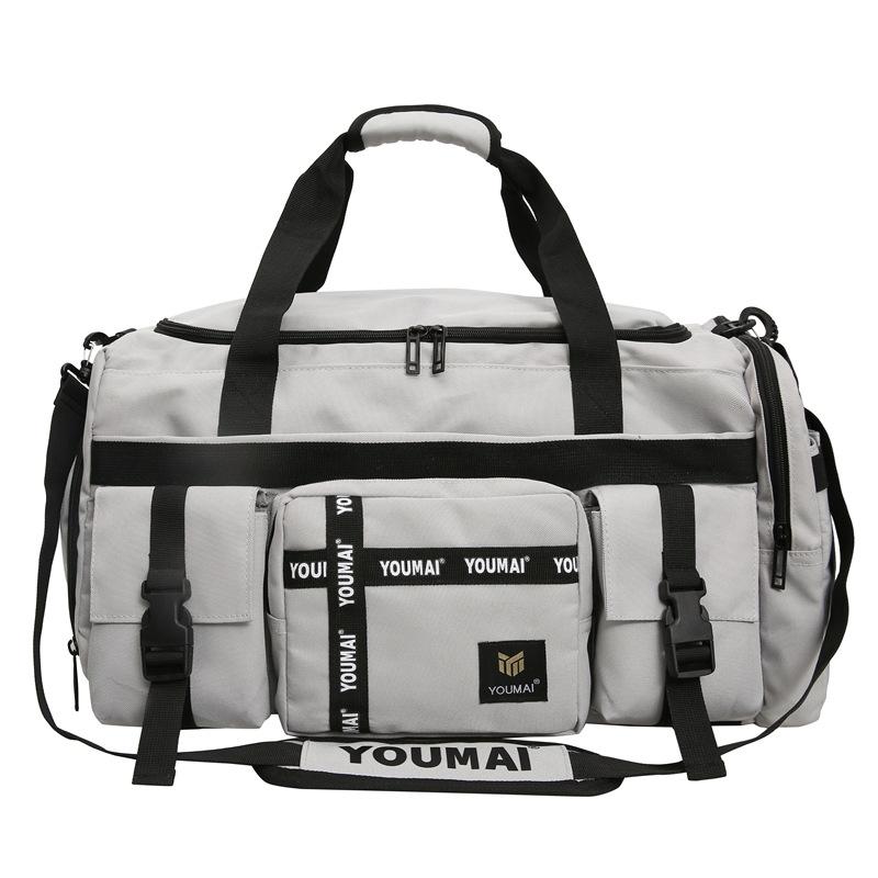 Travel bag large capacity high sense high value fitness bag dry and wet separation light backpack men's messenger bag