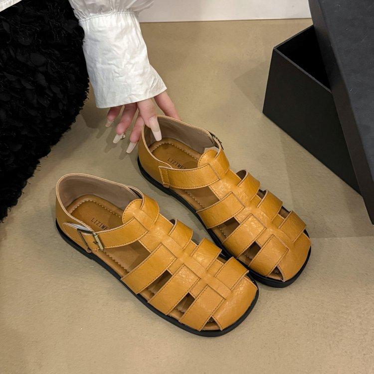 Soft-soled French retro woven bag head sandals women's fashion 2025 summer fairy wind flat-soled pregnant women Roman shoes tide