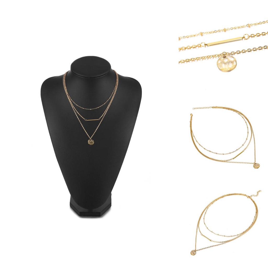 Elegant Multi-layered Gold Necklace Featuring Unique Geometric Shapes For Fashion Lovers