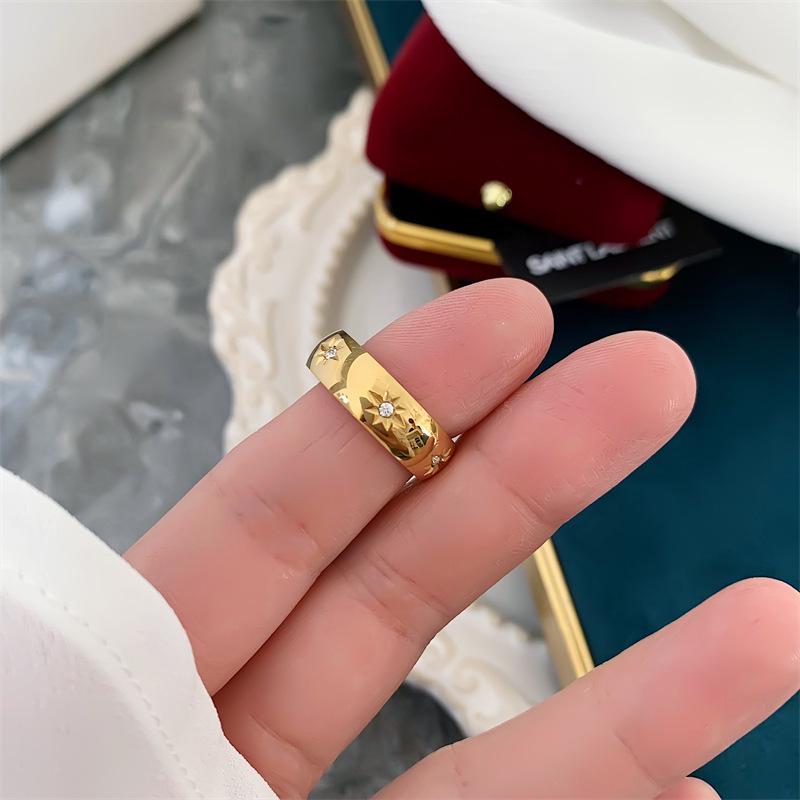 Gold-Plated Titanium Steel Ring with Diamonds and Eight-Pointed Star Design