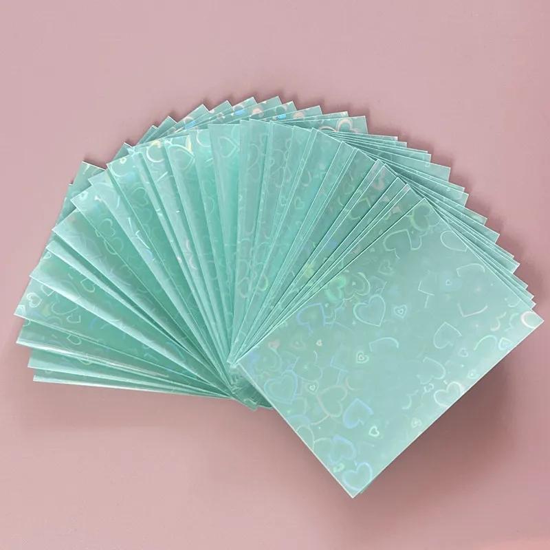 50pcs/lot 61*91mm Heart Love Laser Flashing Card Sleeves Protector For Photo Cards Holder Holographic Foil Protective Films