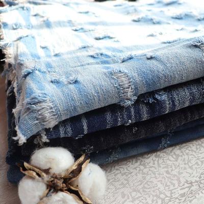 Vintage-Blue-Jeansstoff mit gebrochenen Löchern zum Nähen von Hosen, Jacken, Blazern, modischer Denim-Stoff zum Selbernähen von Kleidungsstücken