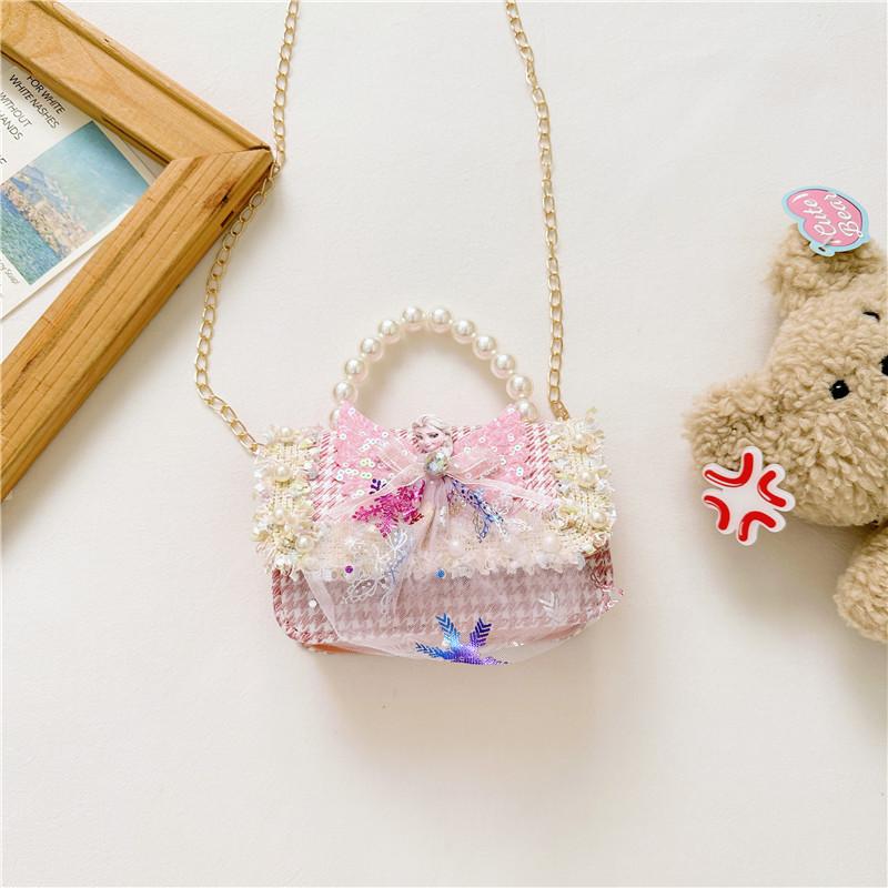 Stilvoller Prinzessinnen-Rucksack für Mädchen, verziert mit Perlen und Cartoon-Mustern in lebendigen Farben