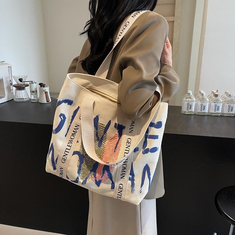 Canvas bag women's 2025 new shoulder bag casual large-capacity Korean version student schoolbag literary and leisure handbag bag