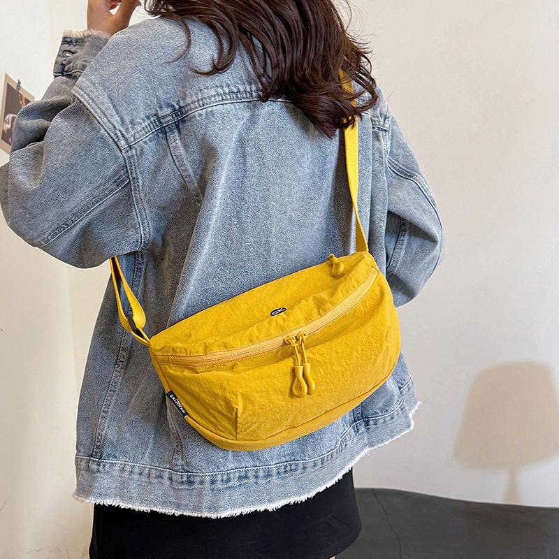 Spring and summer simple and lightweight waterproof messenger bag Oxford cloth versatile women's bag  shoulder nylon cloth breast bag saddle bag