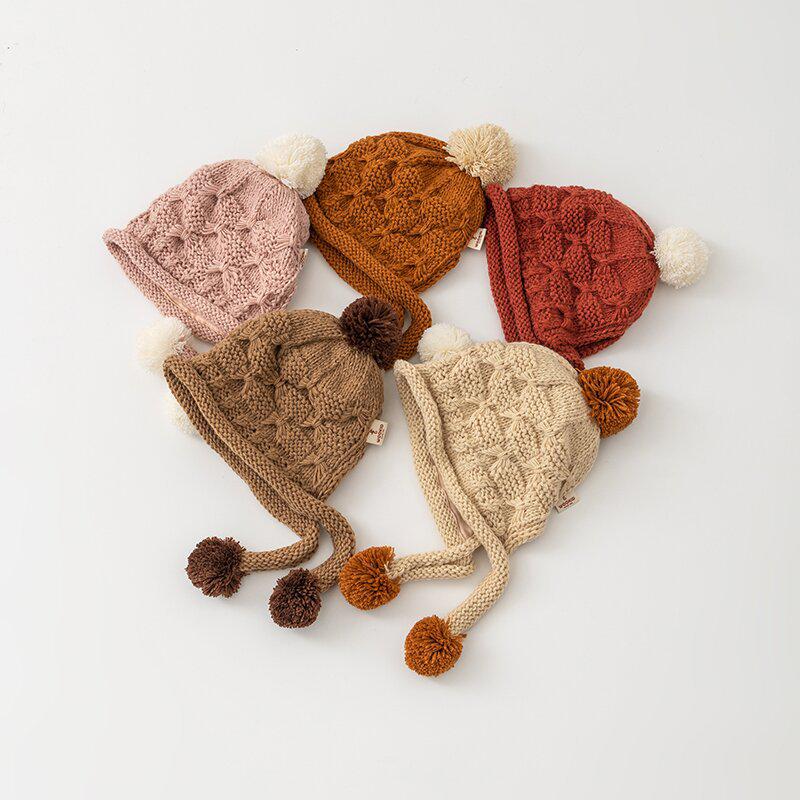 Korean-Style Hand-Knitted Wool Hat for Newborns – Warm, Windproof, and Ear-Protective for Boys and Girls.