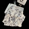 New Chinese Style Ice Silk Pajamas for Women: Cardigan Lapel with Retro Frog Button, Floral Design Home Wear.