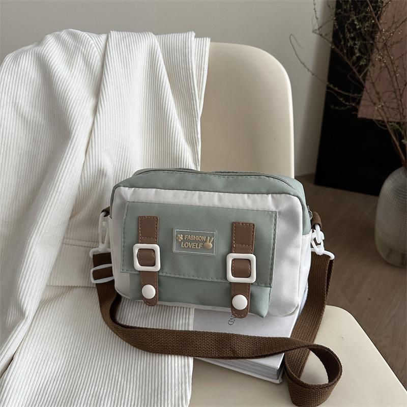 

Cute bag Japanese niche one-shoulder girl messenger bag 2025 new Korean version versatile small fresh canvas bag