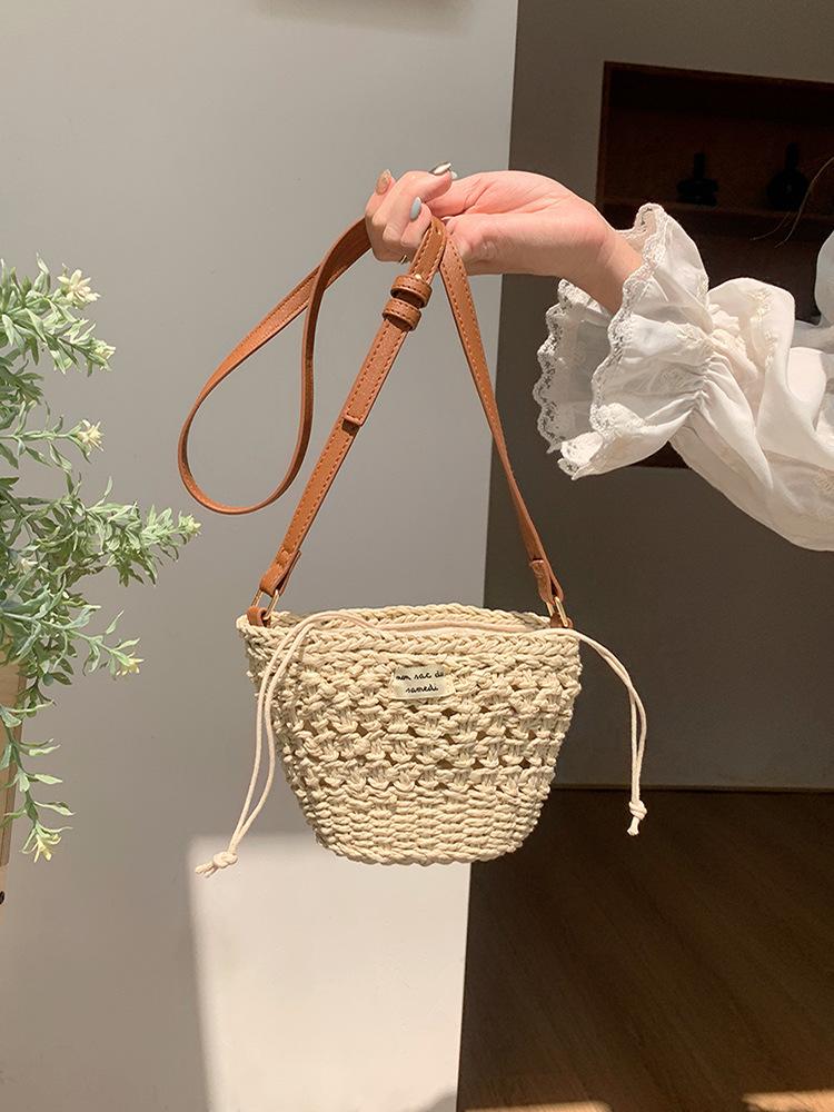 

Cute bucket crossbody straw woven bag new small fresh hollow shoulder woven bag vacation beach bag versatile women s bag абрикосовый
