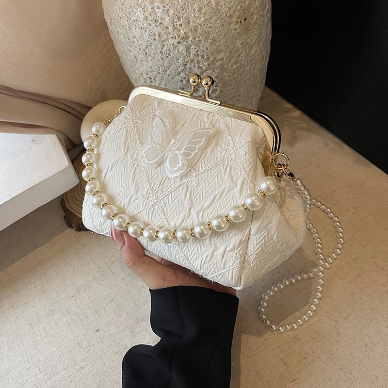 

Embroidery small bag women s summer new fashion pearl chain mouth gold bag versatile messenger bag