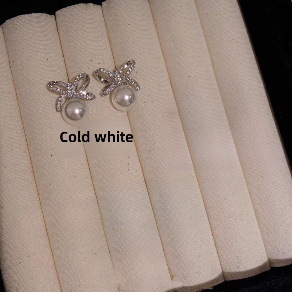 Seiko version earrings, silver needles full of diamonds, bow, Shijia pearl stud earrings, femininity, niche sense, fashionable and high-end earrings.