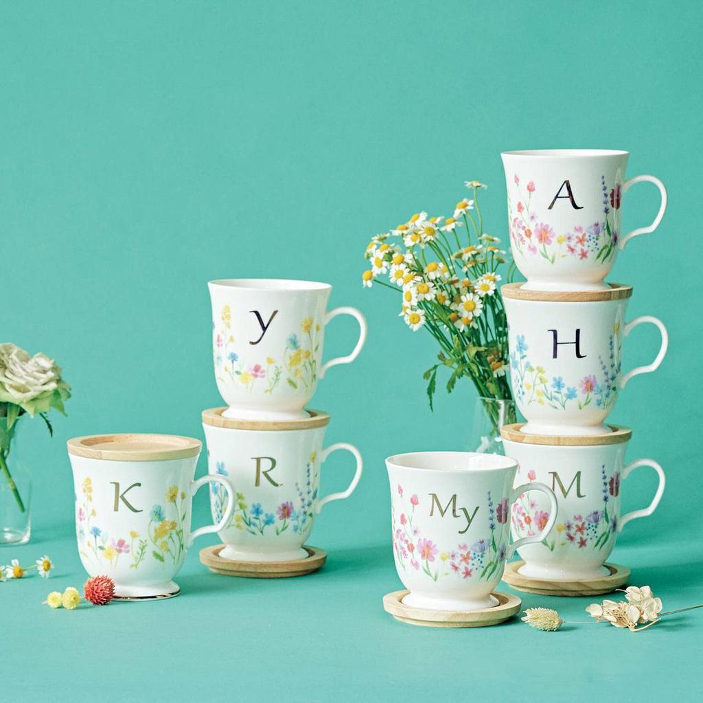 This Elegant 350ml Mug Features a Delicate Floral Design and a Gold Initial It Comes with a Coaster That Doubles As a Lid or Small It Also Comes In a
