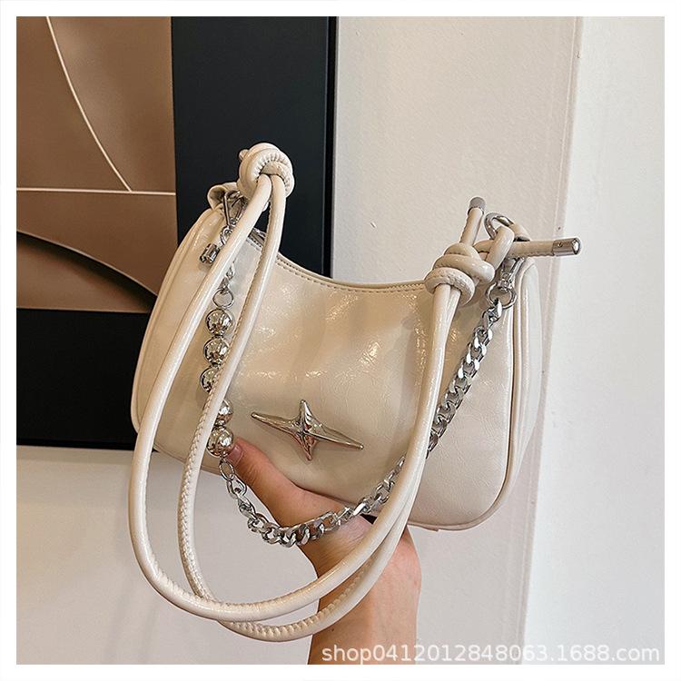 

Модная нишевая маленькая сумка под мышкой женская 2025 новая сумка-пельмень звезды интернет-знаменитости корейская версия сумка-мессенджер для通勤 белый