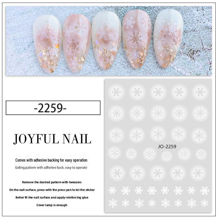 Winter-Schneeflocken-Nagelaufkleber: Festliche weiße Hohlmuster für saisonale Nagelkunst