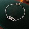 Set Collana e Bracciale Ovali in Zirconia: Eleganti Gioielli dallo Stile Freddo per Donna