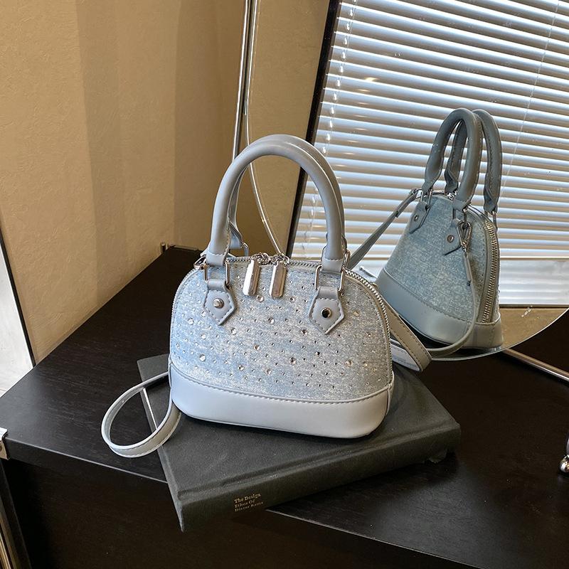 

Stylish portable shell bag women s new simple and versatile messenger bag niche shoulder bag синий