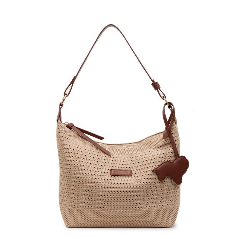 Summer lazy wind large-capacity tote bag women's new niche light luxury hand-woven underarm bag beach bag
