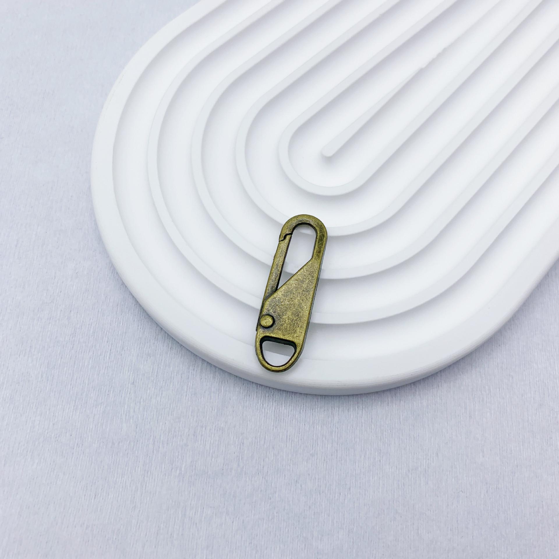 

Tool-Free Alloy Zipper Pull Replacement for Handbags, Backpacks, Jackets, Clothes, and Shoes