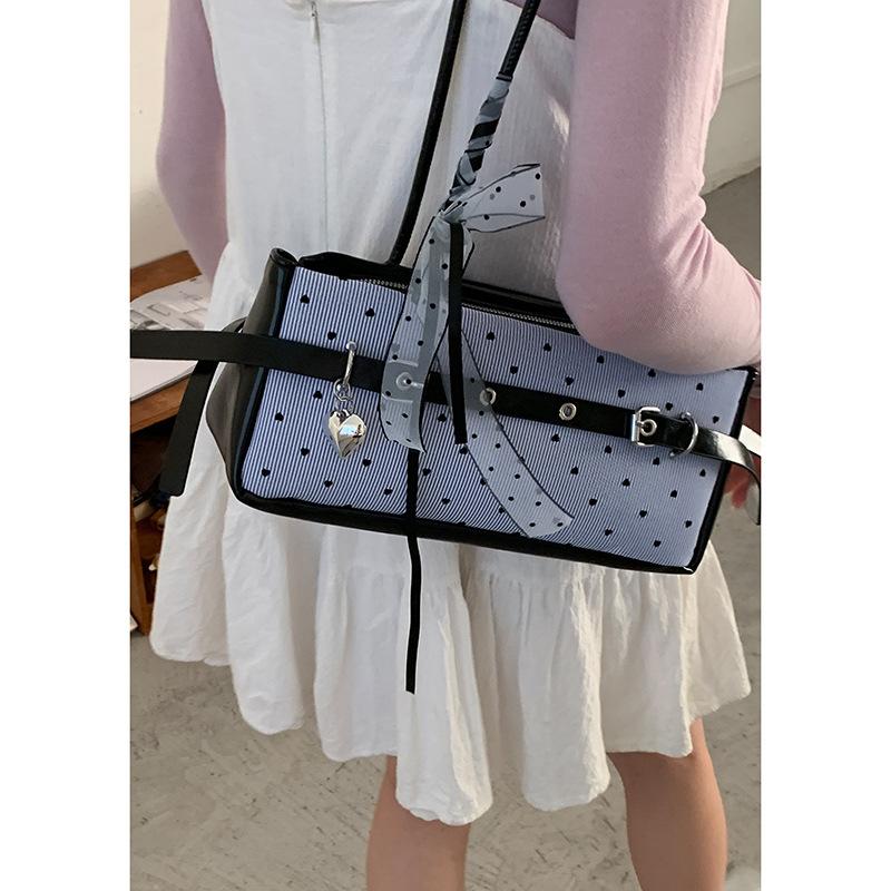 

Korean striped canvas splicing underarm bag women s 2025 new niche texture casual shoulder bag portable commuter bag