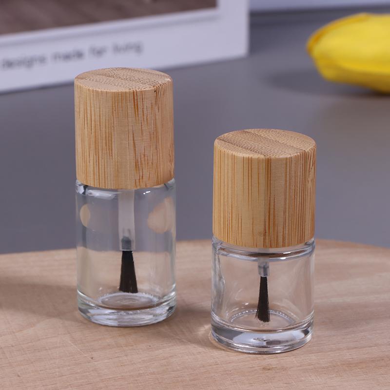 Cylindrical Glass Nail Oil Bottles with Solid Wood and Bamboo Caps – Available In 5ml, 10ml, and 15ml Capacities