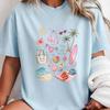 Beach Day Good Vibes Hand Drawn Doodle Collage Graphic, Light Blue Coastal Bikini Palm Tree Surfboard Vacation Relaxed Fit Casual Tee