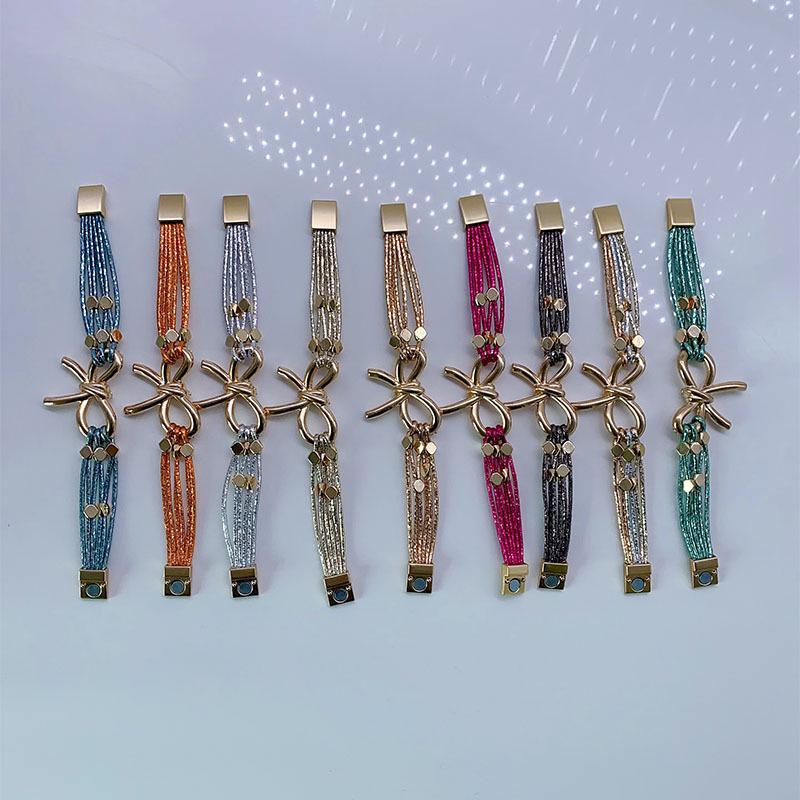 Modna europejska i amerykańska skórzana bransoletka z magnetycznym zapięciem w kształcie kokardy - Modna biżuteria damska na Boże Narodzenie