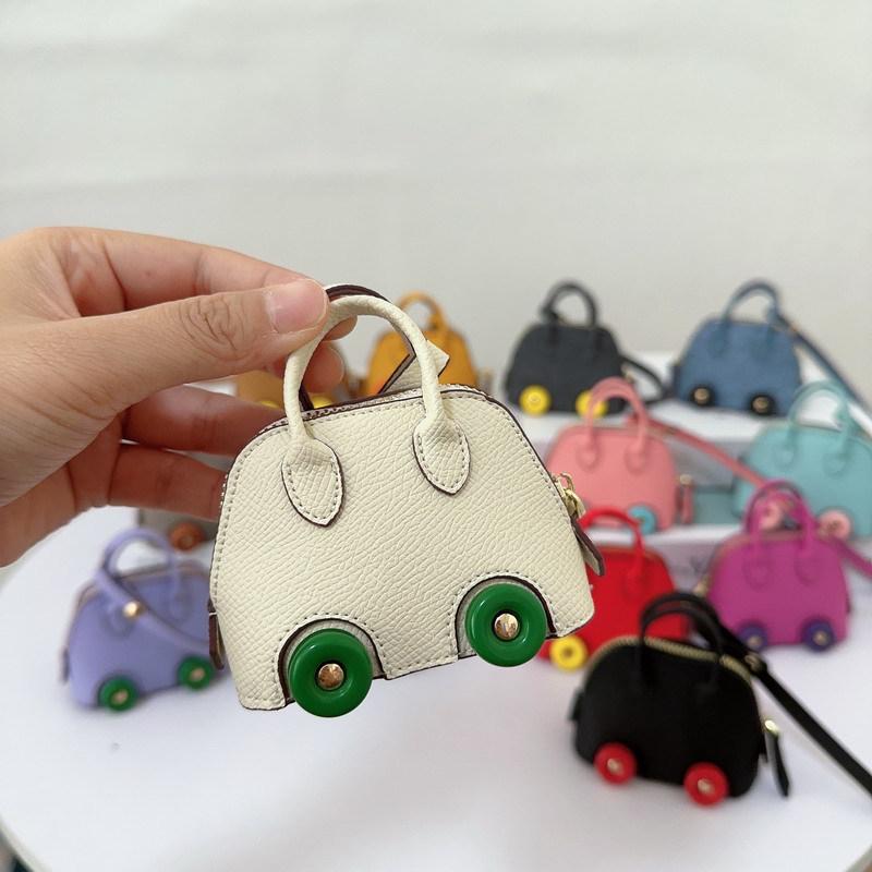 

Mini Cross-Border Wheel Shell Bag: Cute Lipstick and Earphone Holder with New Style Bowling Bag Pendant Accessories білий